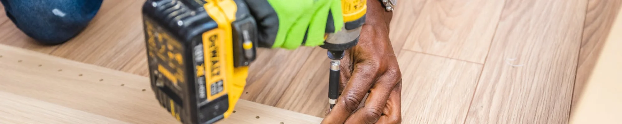 person installing hardwood flooring from Midstates Flooring Center LLC. in Brookings, SD