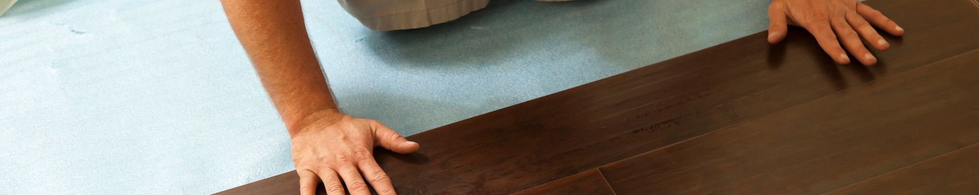 person installing hardwood flooring from Midstates Flooring Center LLC. in Brookings, SD